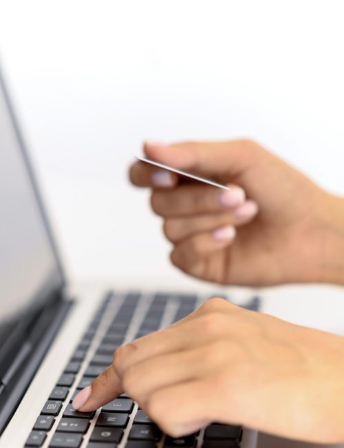 side-view-woman-shopping-online-with-laptop-cyber-monday (1)
