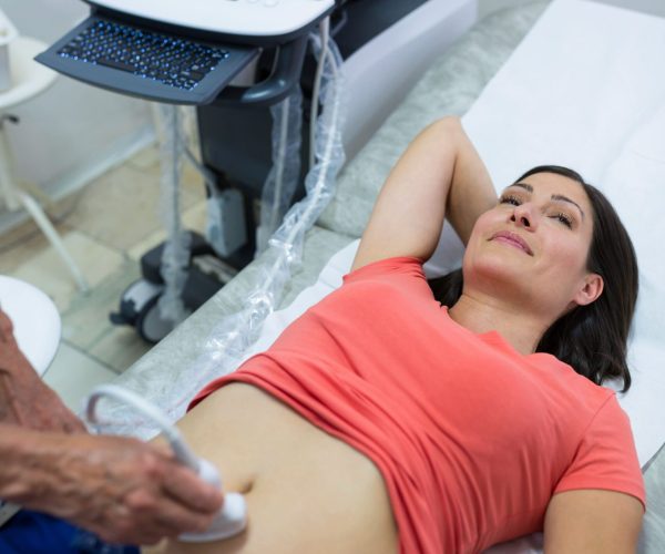 woman-getting-ultrasound-abdomen-from-doctor (1)